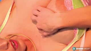 Big-titted Cindy Cupps returns to Mammary Lane, savoring her jugs again.