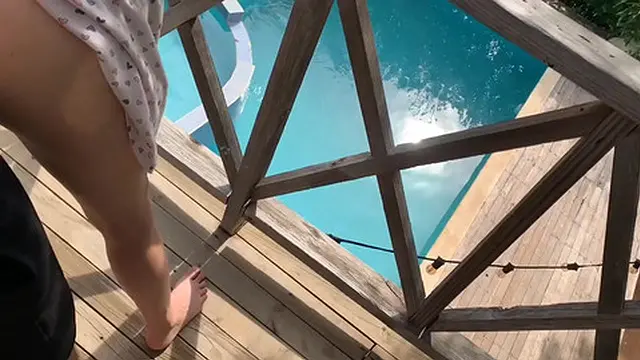 I fuck my girlfriend-in-law on the balcony while my wife is in the pool
