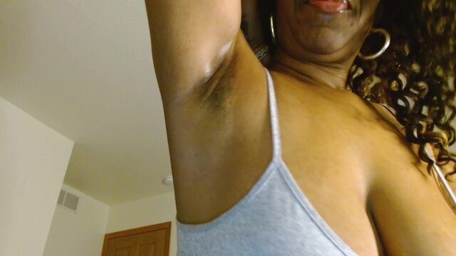 Black domme dominates with a dripping, sloppy armpit kiss